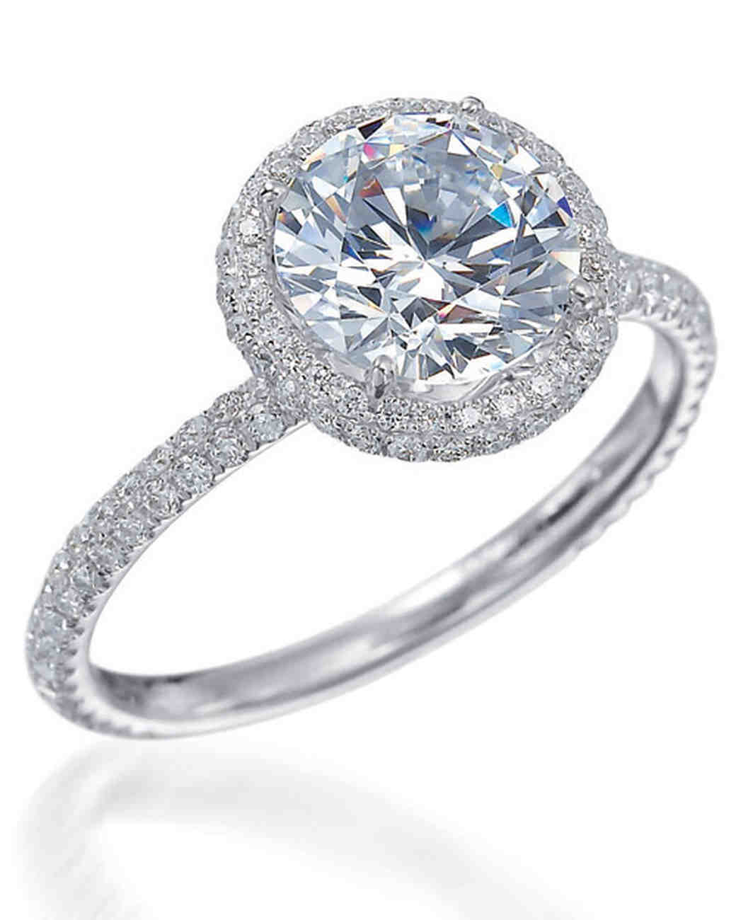 Round Cut Diamond Engagement Ring With A Compass Prong Three Phases