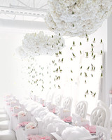white tables cascading flower display