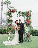 59 Wedding Arches That Will Instantly Upgrade Your Ceremony Fl Wedding Arch With Roses Vines And Berries