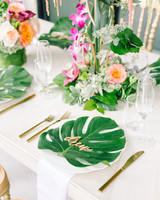 Island Time 33 Tropical Wedding Ideas We Love Martha Tropical Place Setting With Palm Leaf On Plate