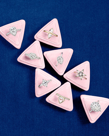 pointed wedding rings in boxes