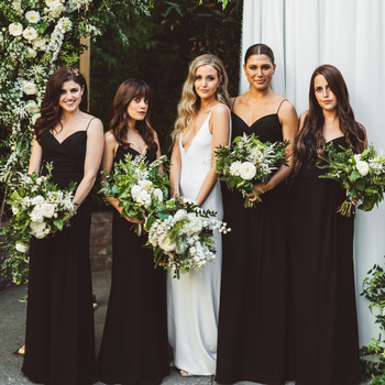 wedding party with black bridesmaid dresses
