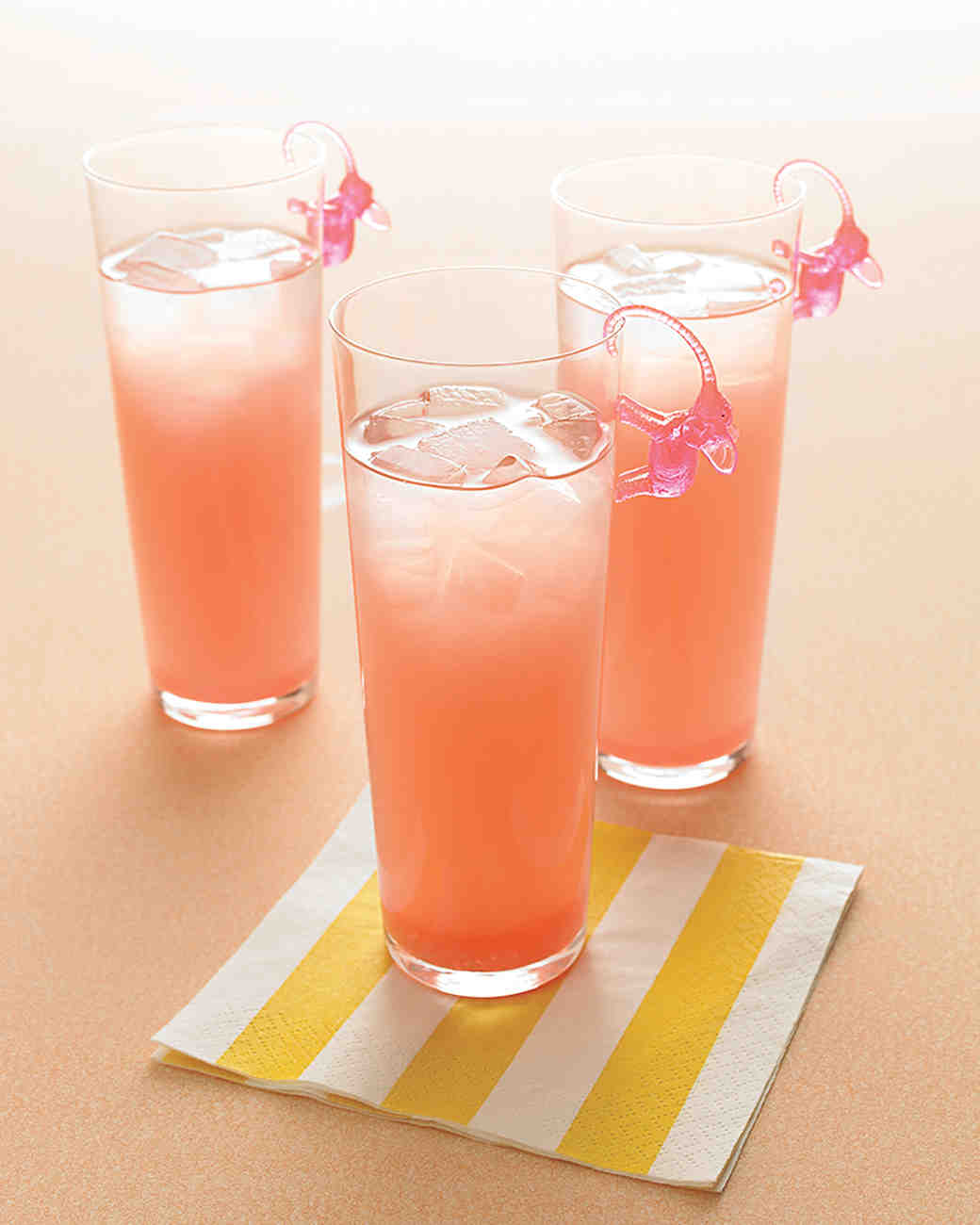 See More From Brit + Co The Bluewater. Peach vodka, peach schnapps, lime juice, and blue Curaçao. If you’re lucky, you might reel one in! Coral-Rita. Not your average ‘rita!