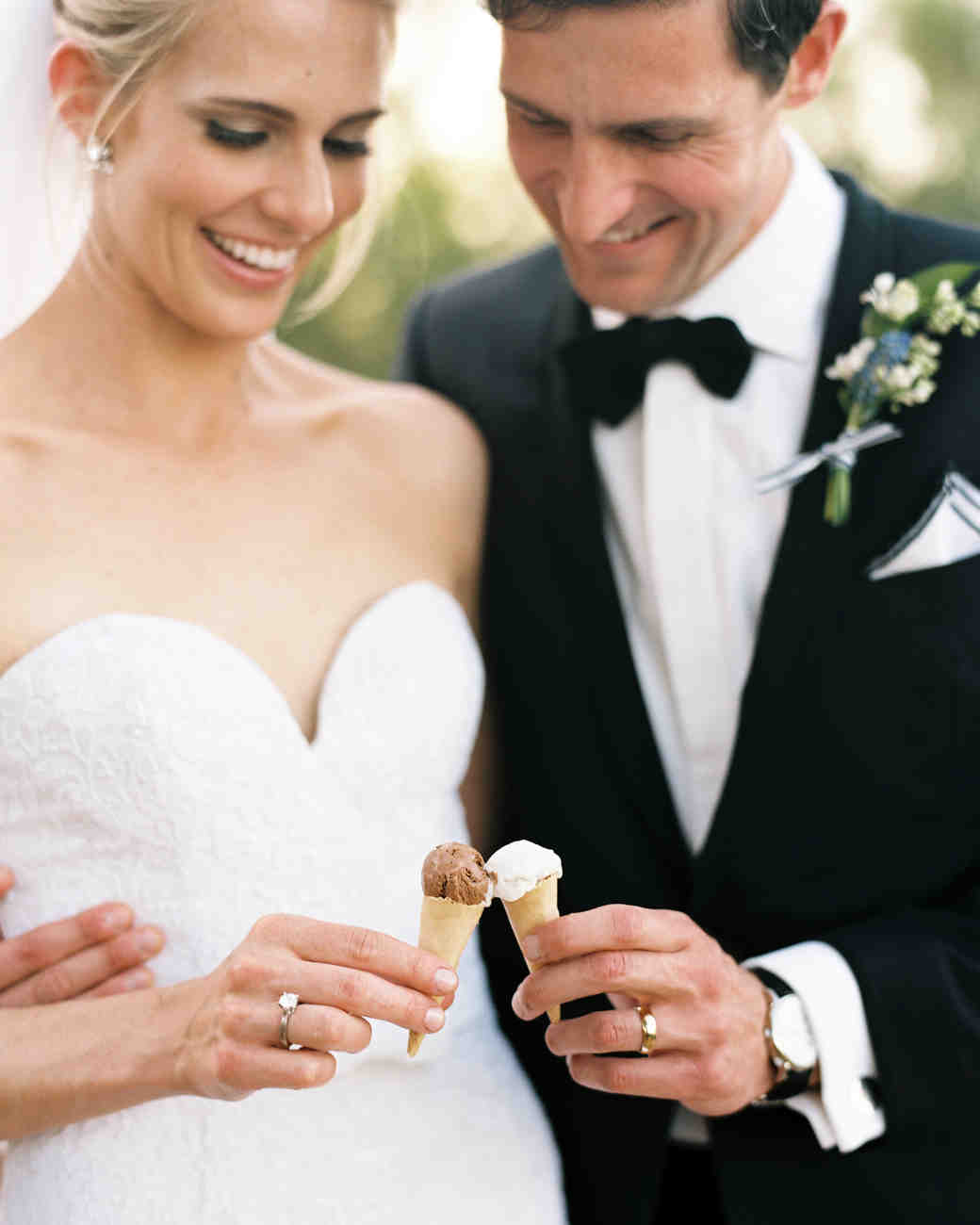 14 Mouthwatering Ways To Serve Ice Cream At Your Wedding Martha Bride And Groom Holding Mini Ice Cream Cones
