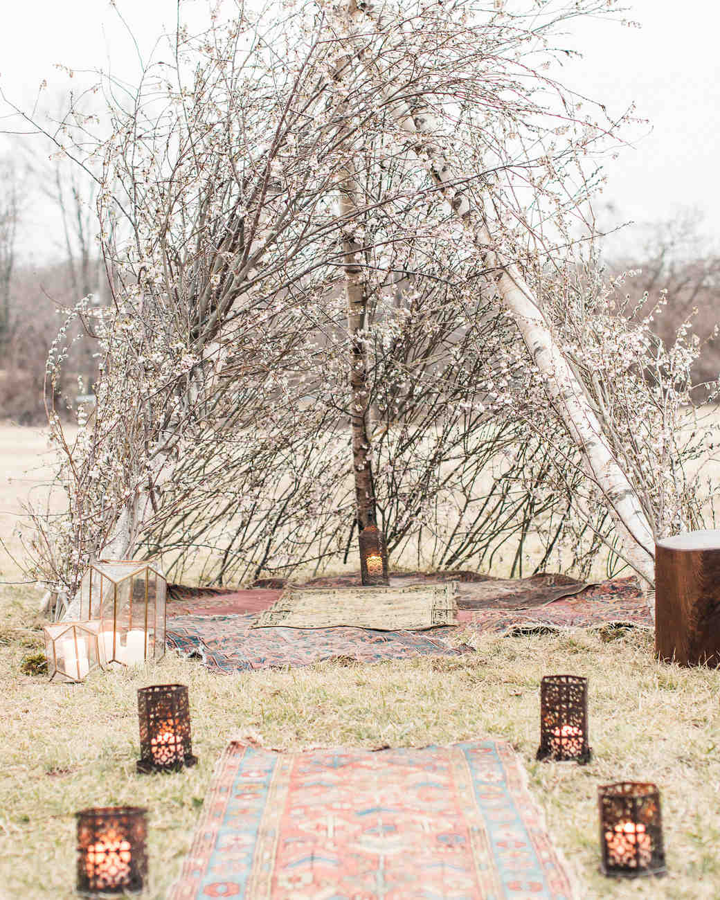 A Bohemian Wedding Trend We're Loving Ceremony Aisles with Rugs