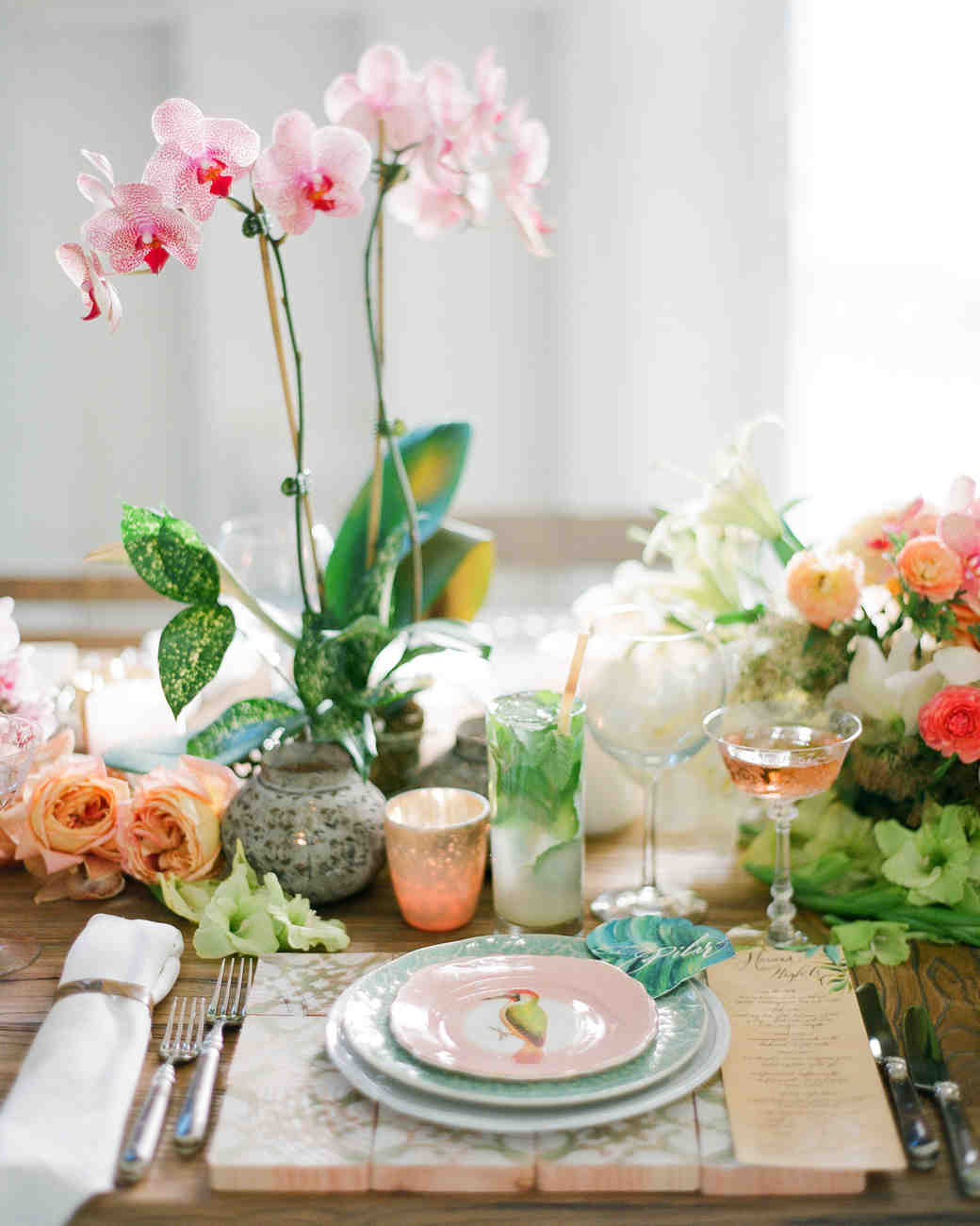 Island Time 33 Tropical Wedding Ideas We Love Martha Tropical Place Setting With Orchids And Patterned Plates