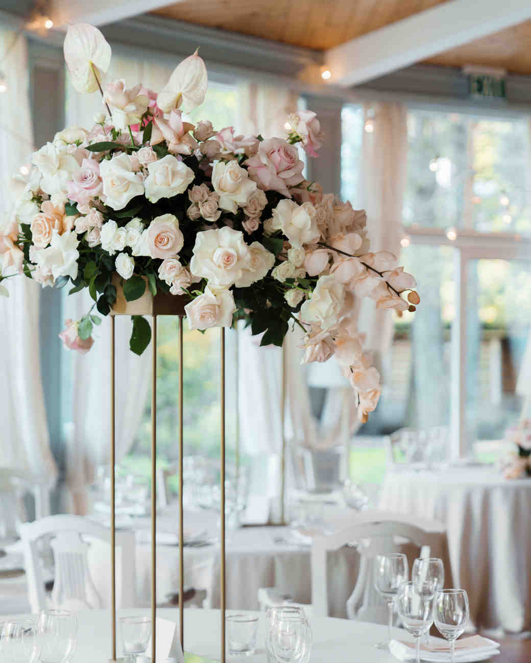 29 Tall Centerpieces That Will Take Your Reception Tables To New