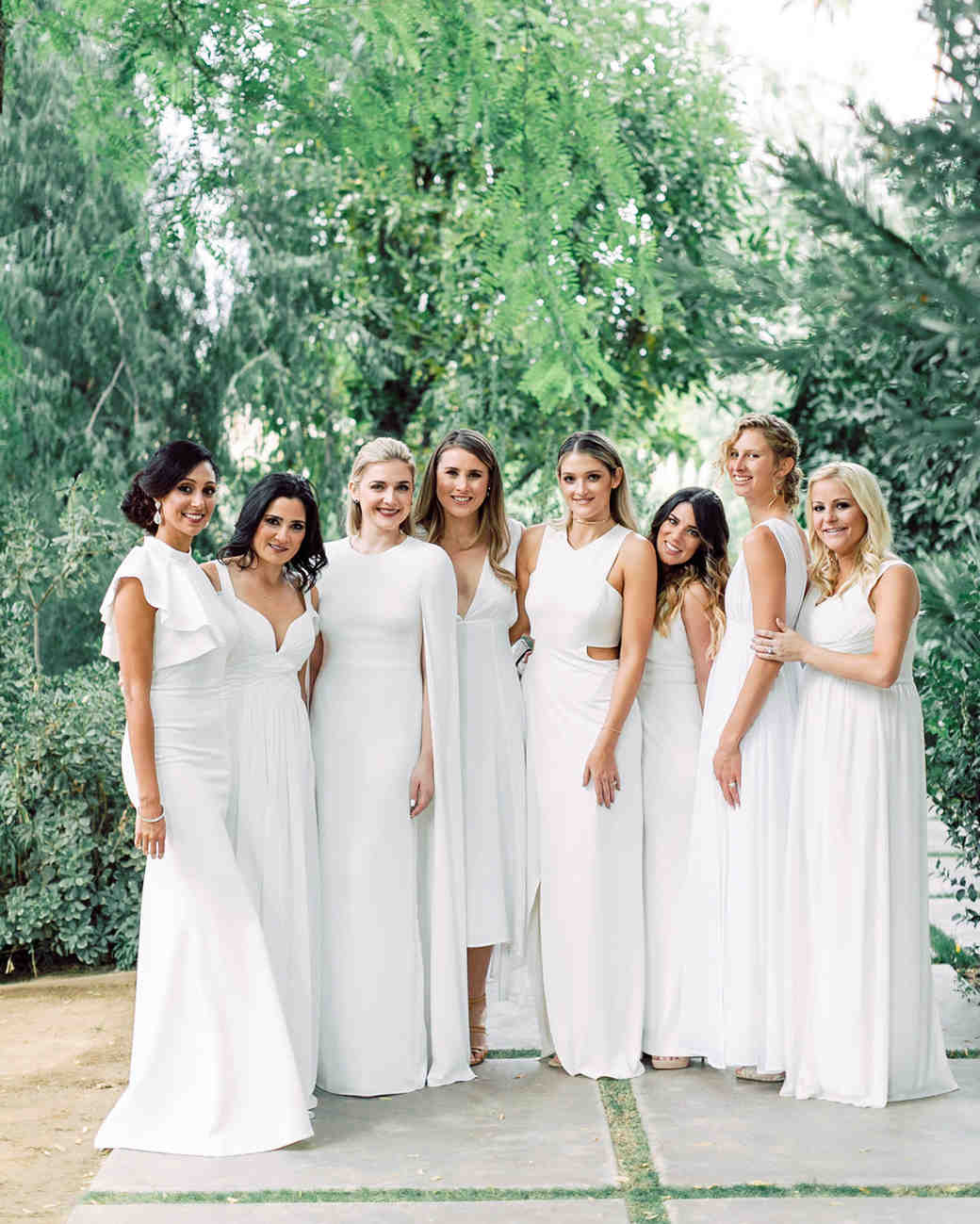 bride with white bridesmaid dresses