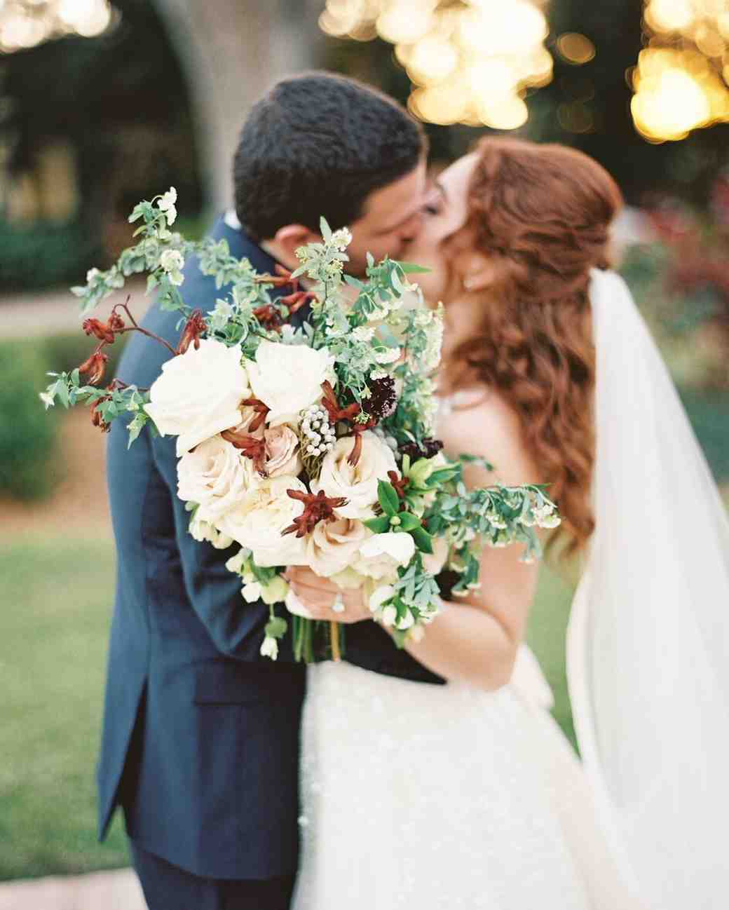 52 Gorgeous Winter Wedding Bouquets Martha Weddings Kissing With Bouquet