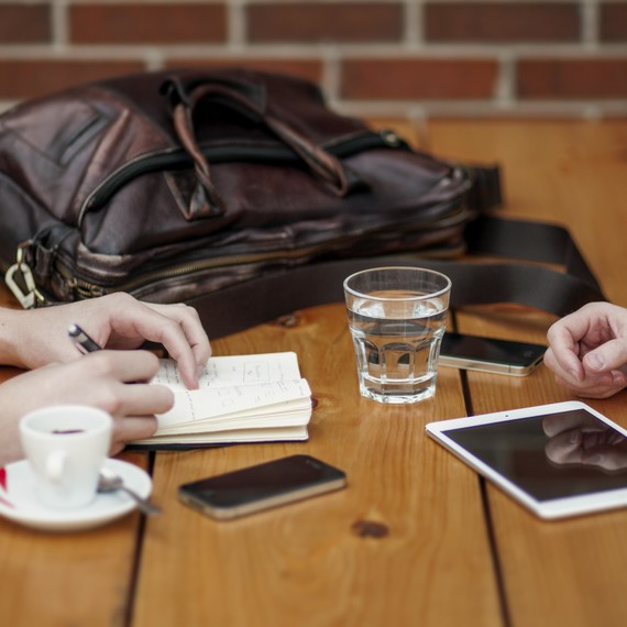 couple planning at table couple planning at table