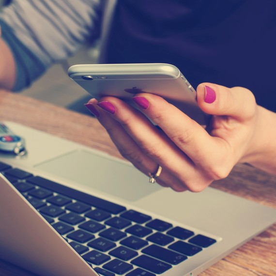 woman-holding-smartphone-1015