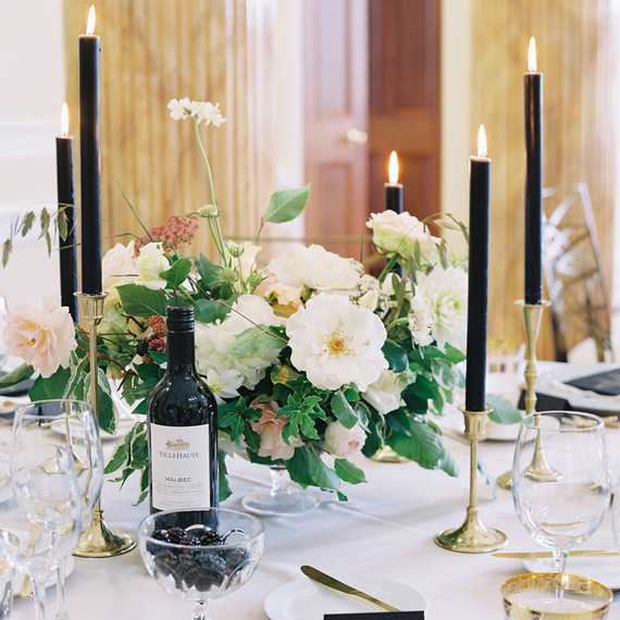 short floral centerpieces and tall black candle reception table decor short floral centerpieces and tall black candles reception table decor