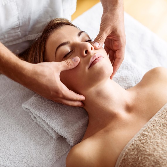 woman getting facial woman getting facial