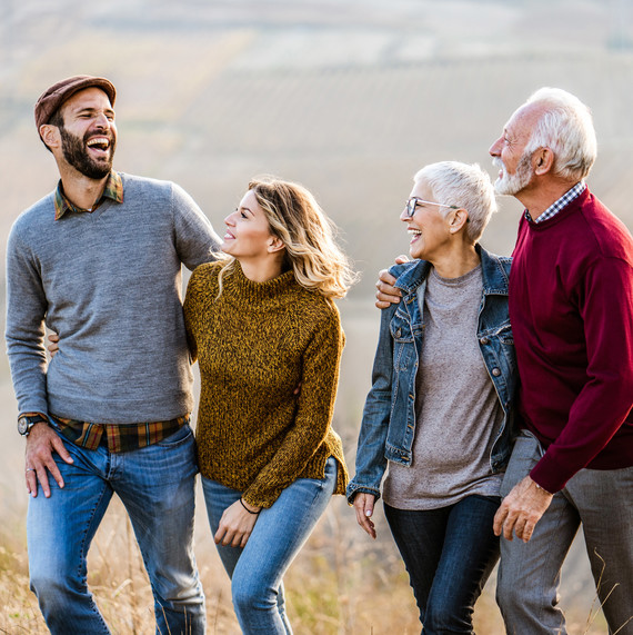 Couple Walking Outdoors with In-Laws Couple Walking Outdoors with In-Laws