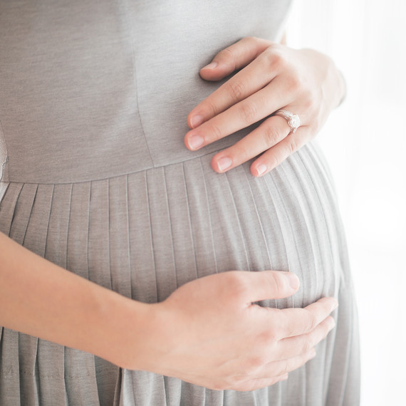 Woman Holding Pregnant Belly Woman Holding Pregnant Belly