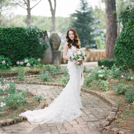 adrienne cameron wedding bride standing in garden adrienne cameron wedding bride standing in garden