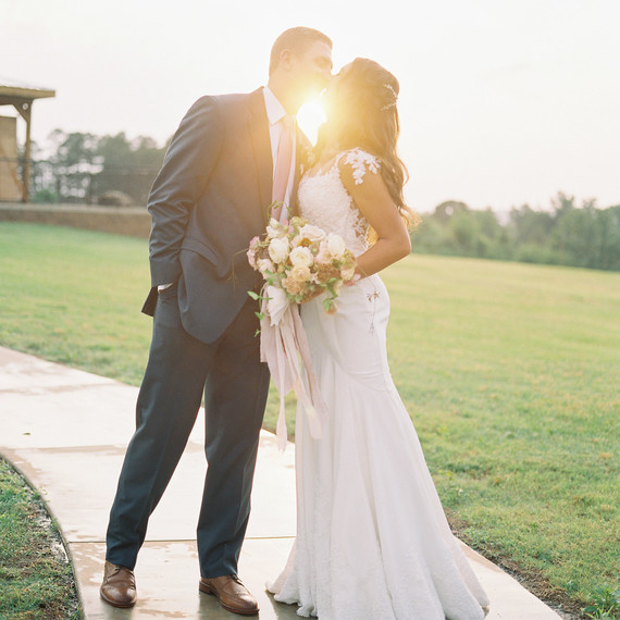 wedding couple kiss sun silhouette sidewalk wedding couple kiss sun silhouette sidewalk
