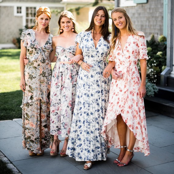 chic bridesmaids long floral dresses with earrings chic bridesmaids long floral dresses with earrings