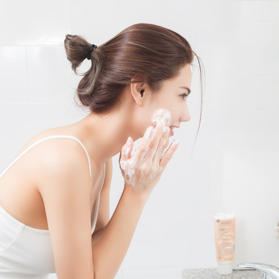 Young Woman Washing Her Face Young Woman Washing Her Face