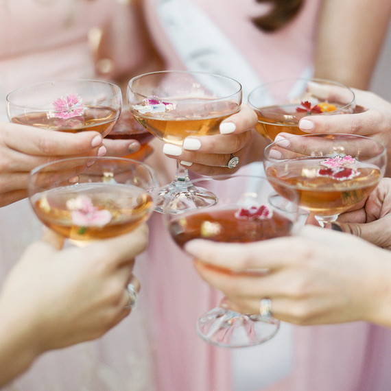 women toasting with cocktails women toasting with cocktails