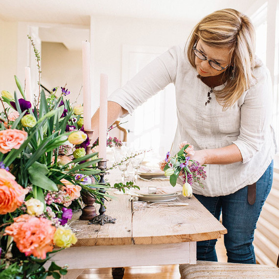 Holly Heider arranging floral centerpiece Holly Heider arranging floral centerpiece