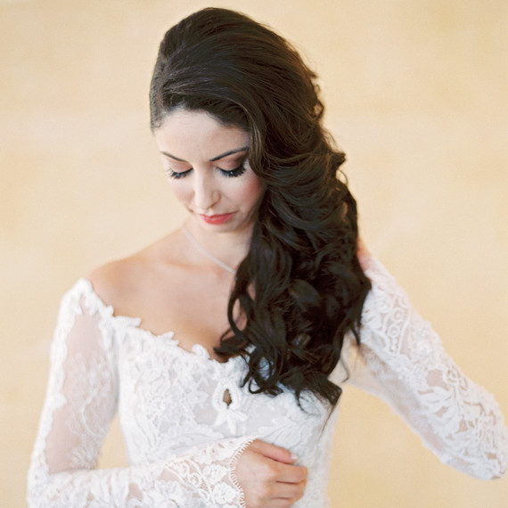 bride with off-the-shoulder dress and side-swept hair bride with off-the-shoulder dress and side-swept hair