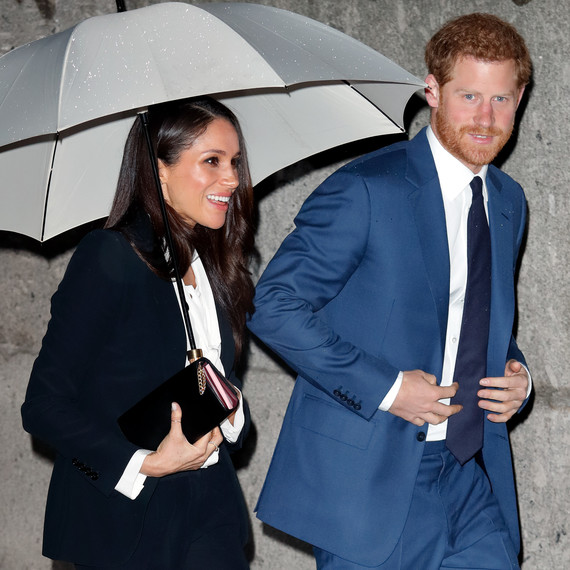 Meghan Markle and Prince Harry with Umbrella Meghan Markle and Prince Harry with Umbrella