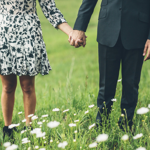 couple holding hands couple holding hands