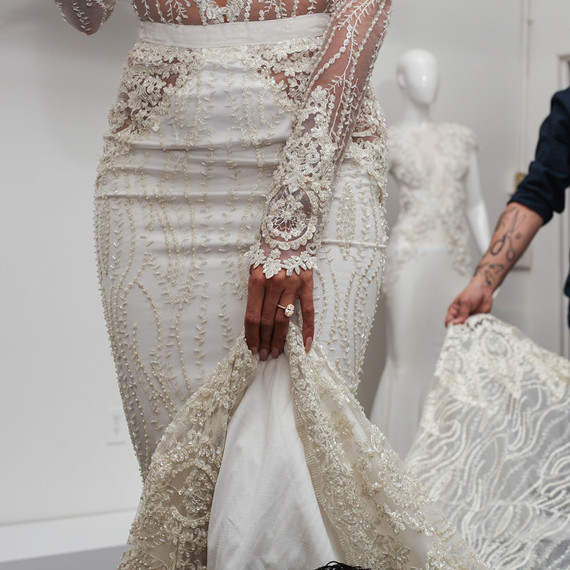 Lace details on Nicole Williams wedding dress by Michael Costello Lace details on Nicole Williams wedding dress by Michael Costello
