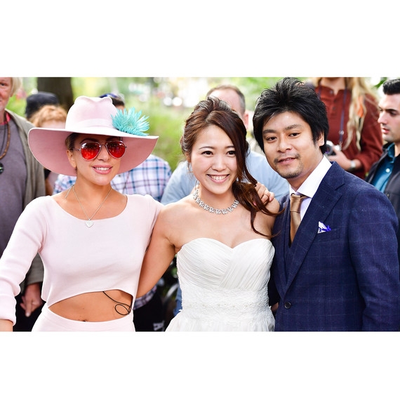 Lady Gaga poses with a bride and groom in Central Park Lady Gaga poses with a bride and groom in Central Park