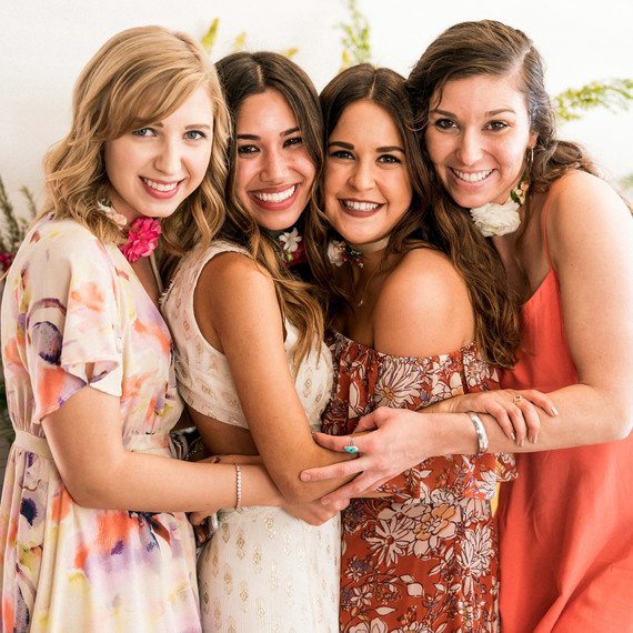 kara bridal shower guests and bride to be posing kara bridal shower guests and bride to be posing