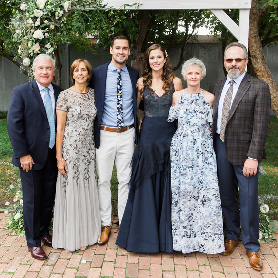 wedding couple with parents wedding couple with parents