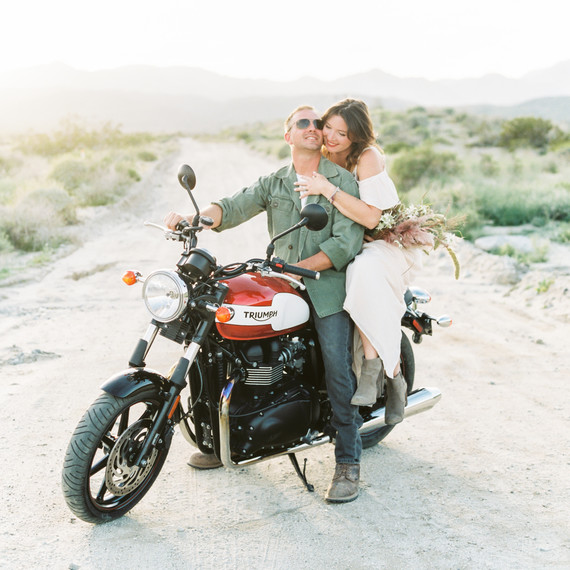 couple on motorcycle engagement photo couple on motorcycle engagement photo
