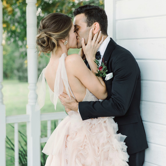 wedding couple kissing porch wedding couple kissing porch