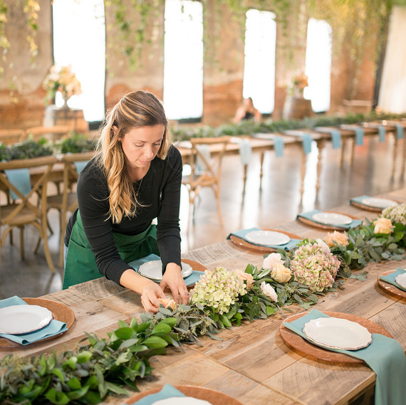 Diana Venditto arranging floral centerpiece Diana Venditto arranging floral centerpiece