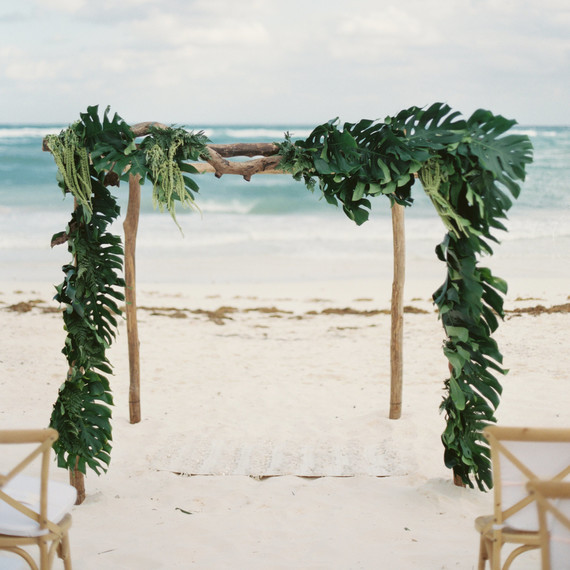 beach altar logs and draped greenery beach altar logs and draped greenery