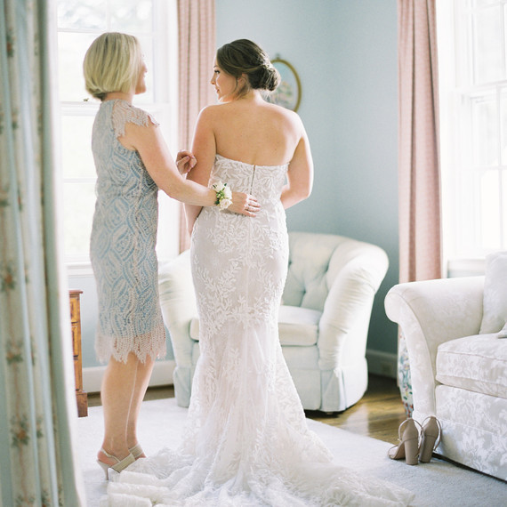 bride mother getting ready for wedding bride mother getting ready for wedding