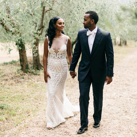 veronica mickias wedding couple holding hands near trees veronica mickias wedding couple holding hands near trees