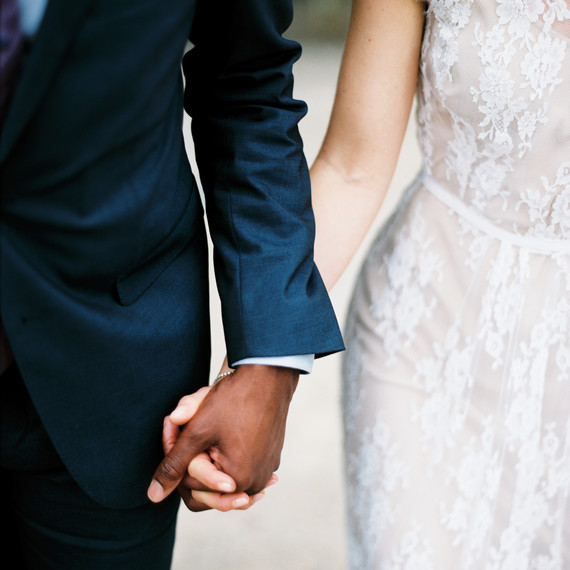 couple holding hands couple holding hands