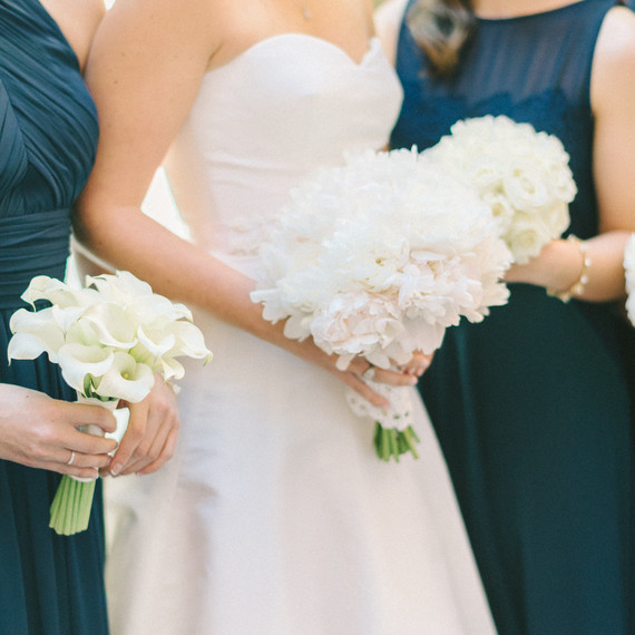 bridal party with white flowers bridal party with white flowers