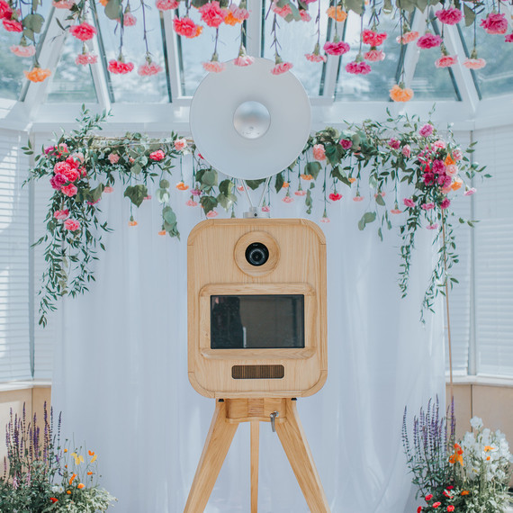 photo booth set up with carnations photo booth set up with carnations