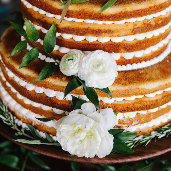 scalloped wedding decor naked cake with white flowers scalloped wedding decor naked cake with white flowers