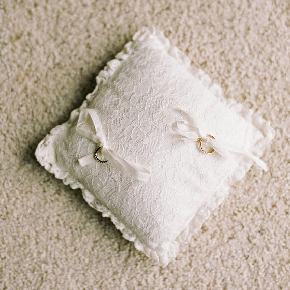 rings tied to white lace pillow rings tied to white lace pillow