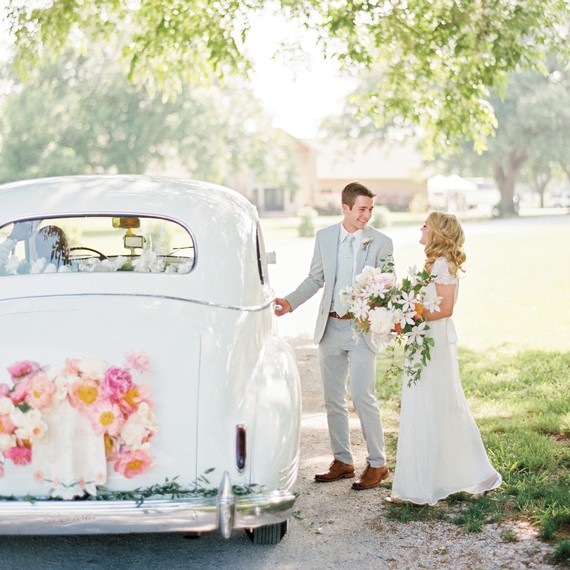 david-tyler-real-wedding-couple-leaving-getaway-car.jpg