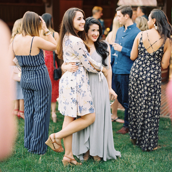 A Guide For Guests What To Wear An Engagement Party Martha Rebecca Clay Rehearsal Dinner Guests Drinking Wine