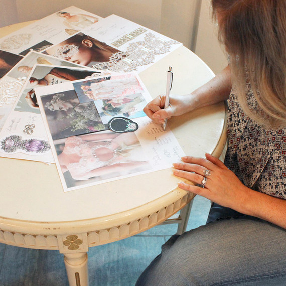 claire-pettibone-ring-collection-writing-at-table-0915.jpg