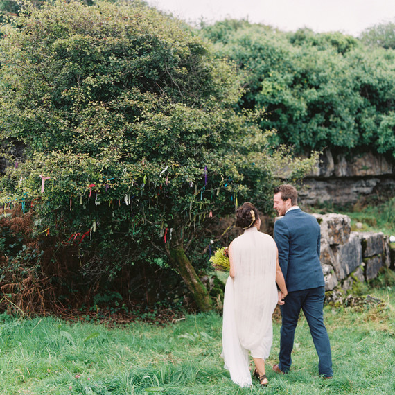 bride and groom walking bush bride and groom walking bush