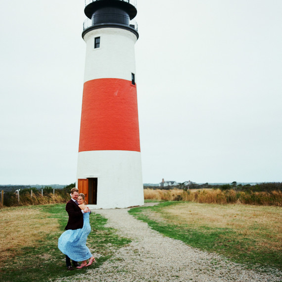 destination engagement couple red and white lighthouse destination engagement couple red and white lighthouse