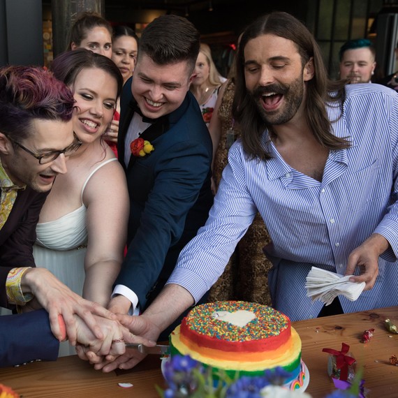 jonathan van ness wedding officiant cutting cake jonathan van ness wedding officiant cutting cake